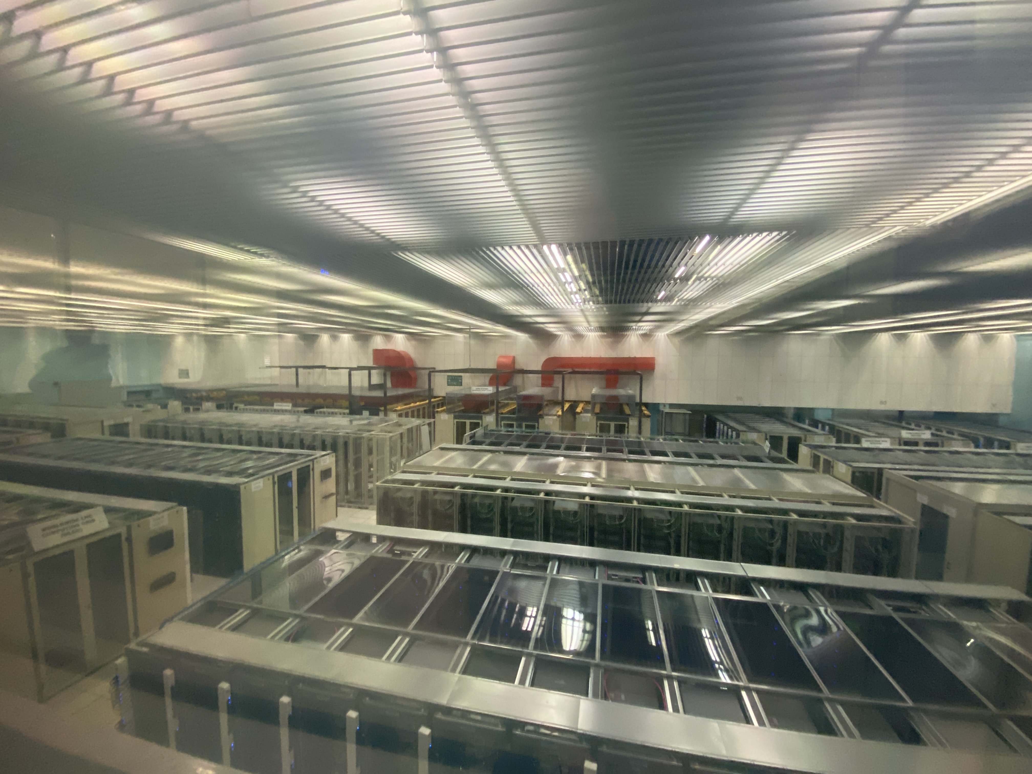 View into a large modern data centre used as a visual reference for cloud infrastructure